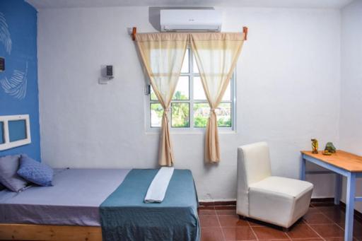 Departamentos Cerca De Ferry Holbox Hotell Exteriör bild